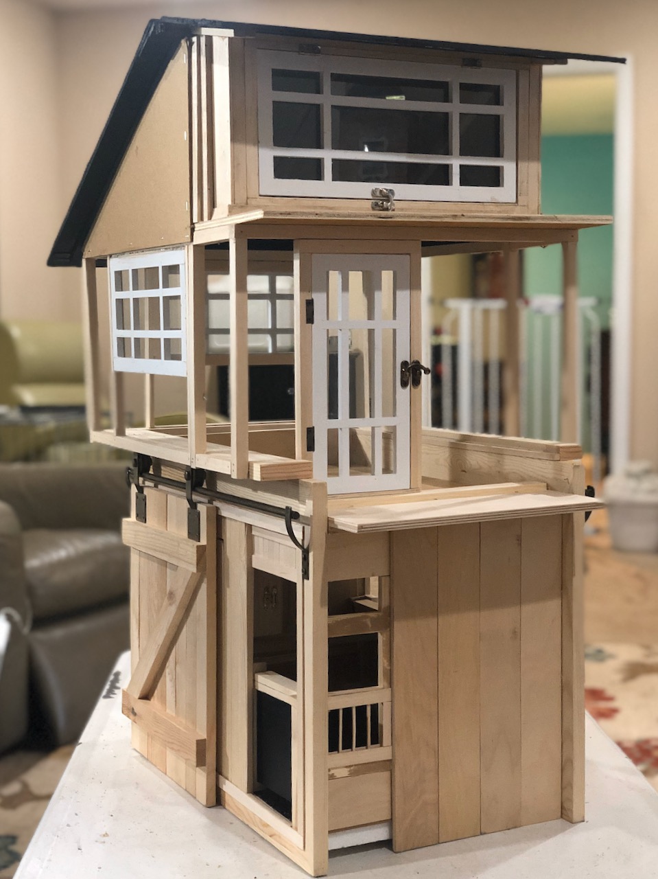 Dollhouse Barn Apartment with roof and eaves installed.